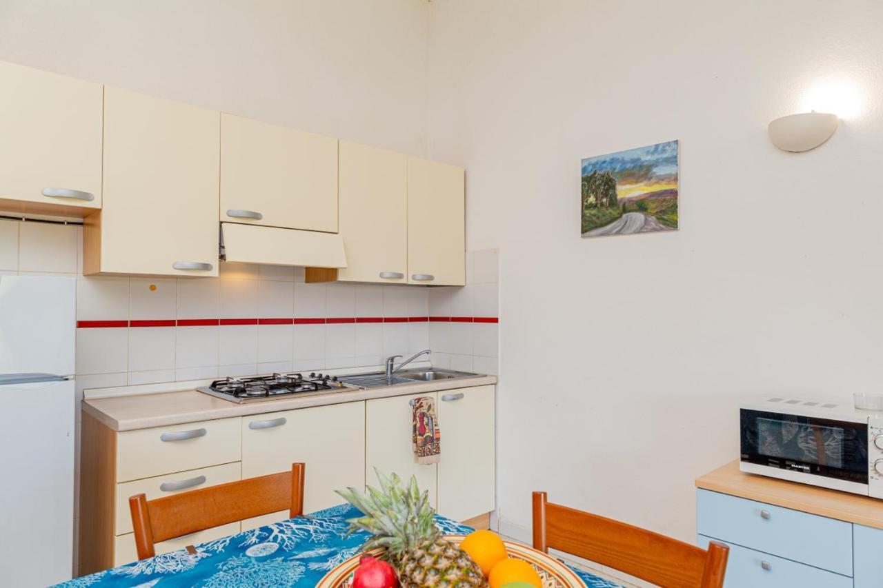 Appartamento Trilocale Le Canne 6 Posti Letto Con Giardino San Teodoro  Bagian luar foto
